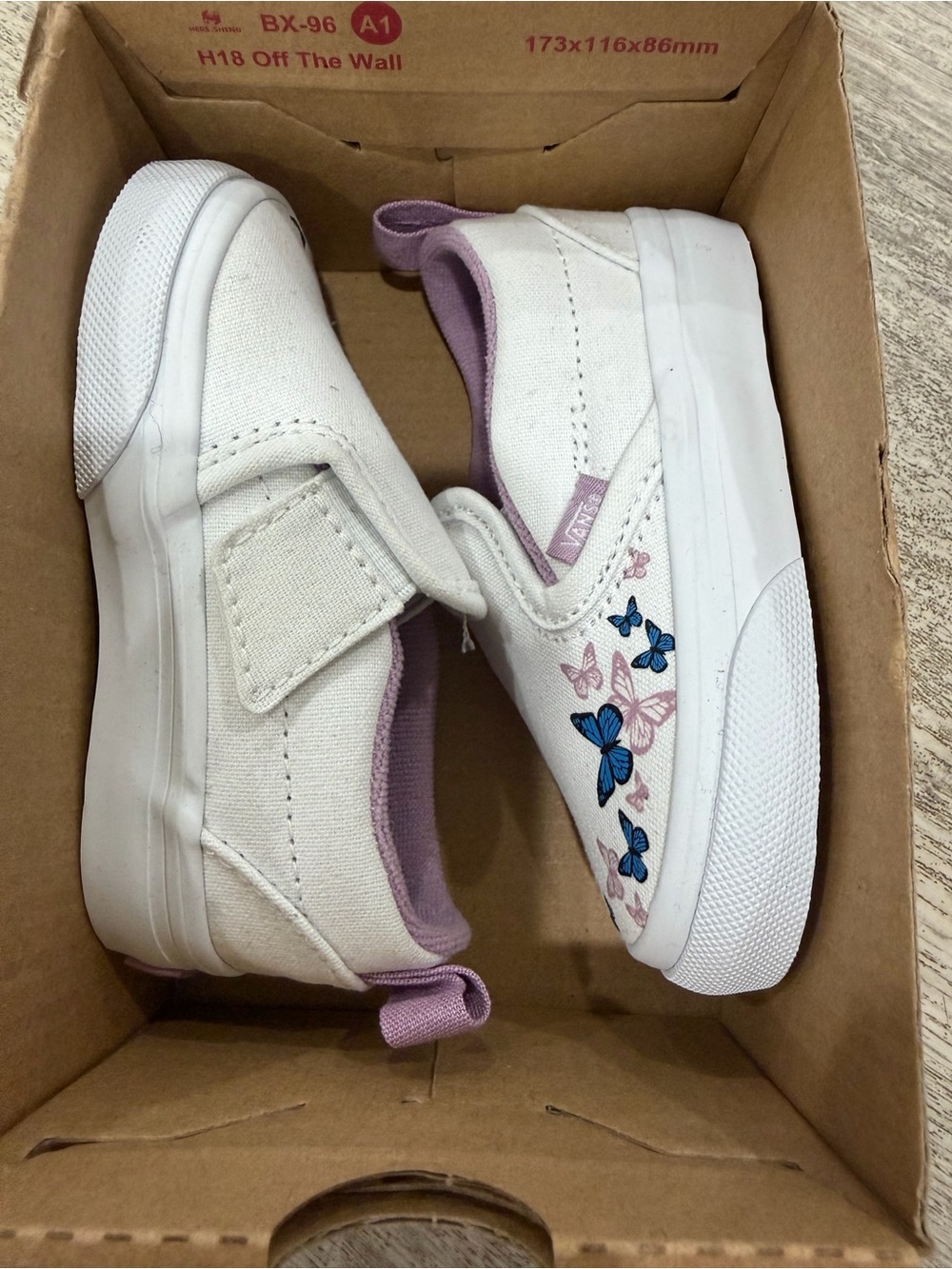 Vans Kids White Canvas Slip-On Sneakers with Purple Trim and Butterfly Motif